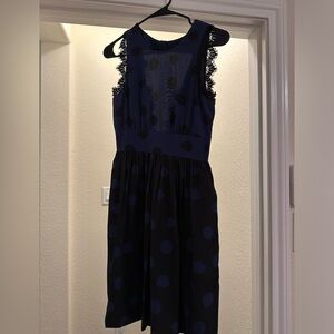 Corey Lynn Calter navy and black dress from Anthropologie